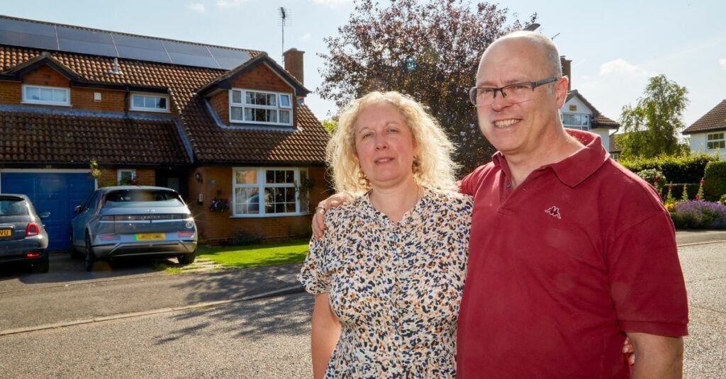 Tim and his partner showcase their solar installation